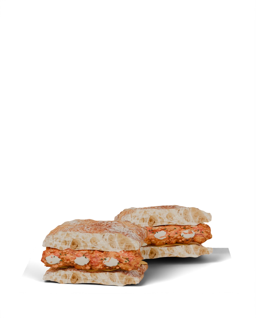 Firebird sandwich with crispy buffalo chicken and melted cheese in ciabatta.