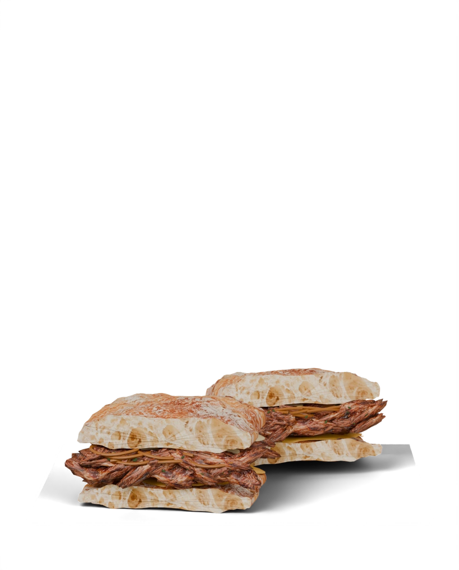 Steakhouse Stack with sliced steak and melted cheese in ciabatta.