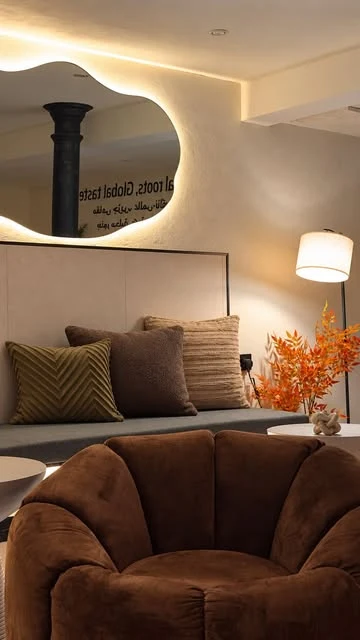 Warm lighting, Venetian plaster and soft seating inside Brewch.