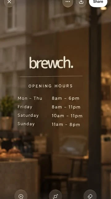 Brewch lettering and opening hours on the cafe window.